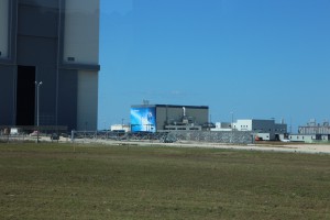 This is the Large... but in this photo seemingly small Boeing building on the site... Next to the VAB. Look how it doesn't even reach the top of the lowest part of the VAB Doors! 