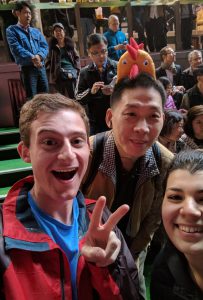 Man with a Rooster on his head… AS YOU DO! Me Donning the seemingly traditional Chinese pose.